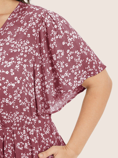 GracefulBloom | Sukienka Bloom – sukienka z falbankami w talię i kieszeniami do kolan w drobne kwiatki