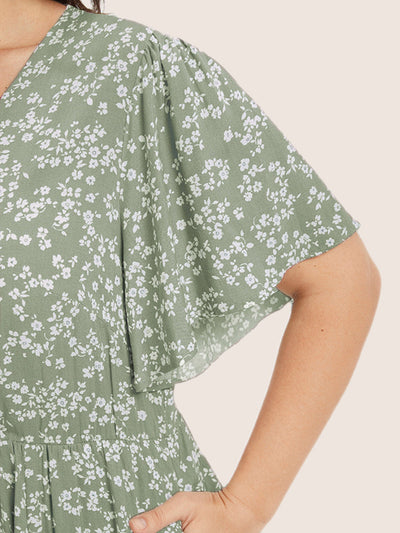 GracefulBloom | Sukienka Bloom – sukienka z falbankami w talię i kieszeniami do kolan w drobne kwiatki