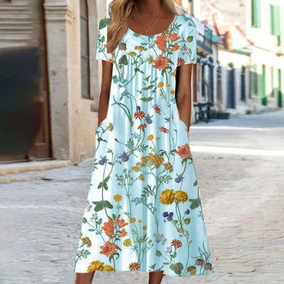 EleganceBloom | Elegancka sukienka z kwiatowym wzorem na brzuchu