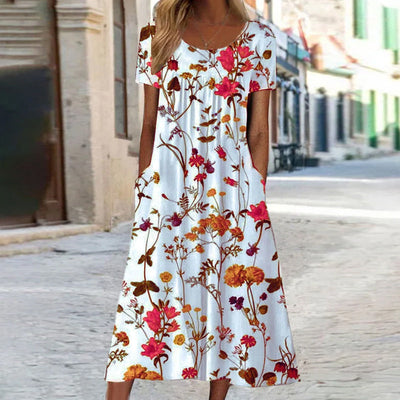 EleganceBloom | Elegancka sukienka z kwiatowym wzorem na brzuchu