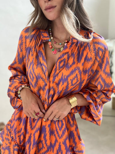 Lessy | Elegancka letnia sukienka w zabawne paski