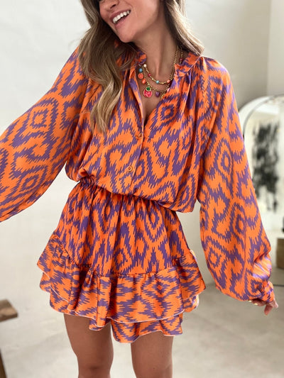 Lessy | Elegancka letnia sukienka w zabawne paski